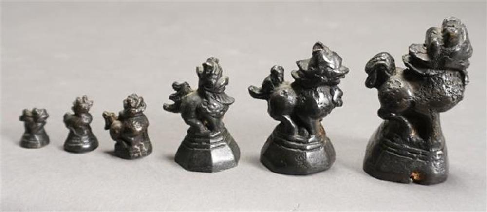 SIX INDIAN BLACK PAINTED BRONZE FOO