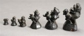 SIX INDIAN BLACK PAINTED BRONZ
