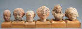 SIX INDIAN PINK-BUFF POTTERY H