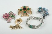 SIX ITEMS COSTUME JEWELRY Sign