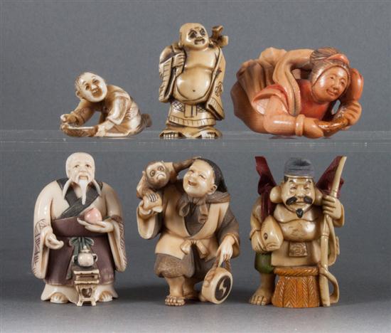 Six Japanese carved and polychromed