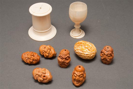 Six Japanese carved fruit pit seeds