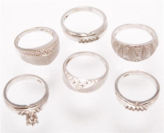 Six ladies' 14K white gold, diamond