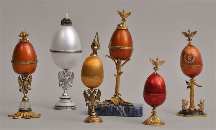 SIX METAL-MOUNTED ENAMEL STEMMED