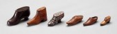 Six miniature shoes, probably
