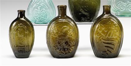 Six mold-blown colored glass flasks