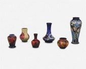 SIX MOORCROFT POTTERY CABINET