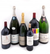 SIX OVERSIZED CHAMPAGNE AND WI