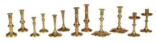 SIX PAIRS OF BRASS TAPER