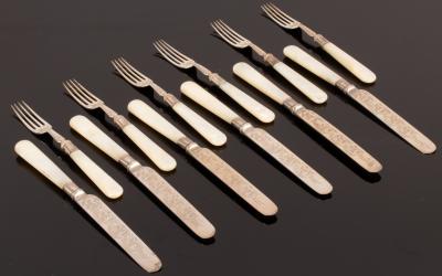 Six pairs of engraved silver