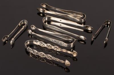 Six pairs of silver sugar nips,