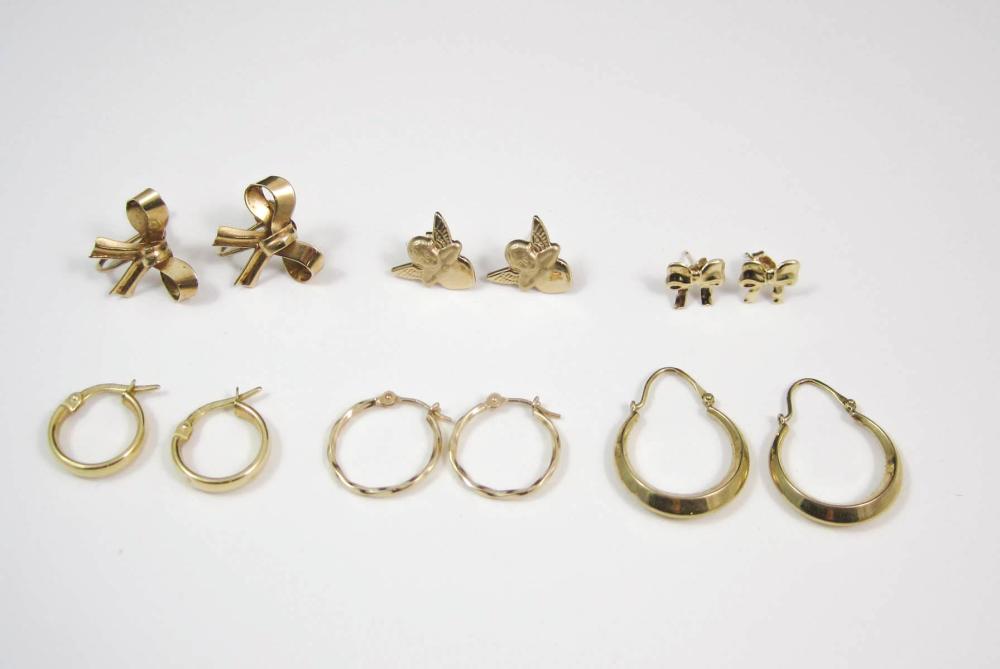SIX PAIRS OF YELLOW GOLD
