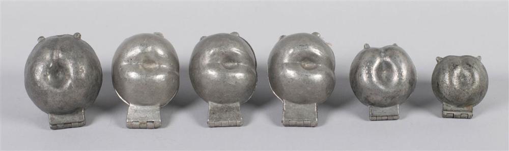 SIX PEACH PEWTER MOLDS, PROBABLY