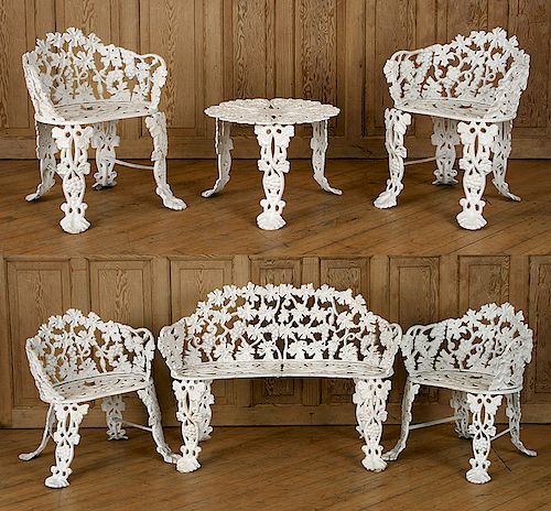 SIX PIECE PAINTED CAST IRON GRAPE