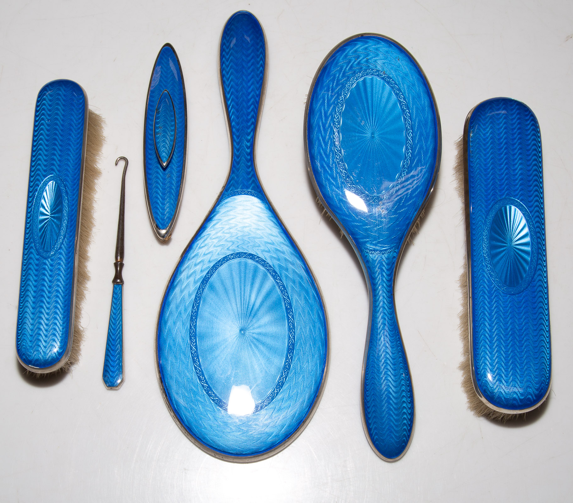 SIX-PIECE STERLING-MOUNTED ENAMELED