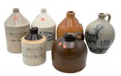 SIX PIECE STONEWARE JUG LOT, A