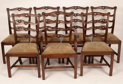 Six pierced and carved mahogany