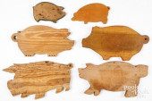 SIX PIG FORM CUTTING BOARDS<br