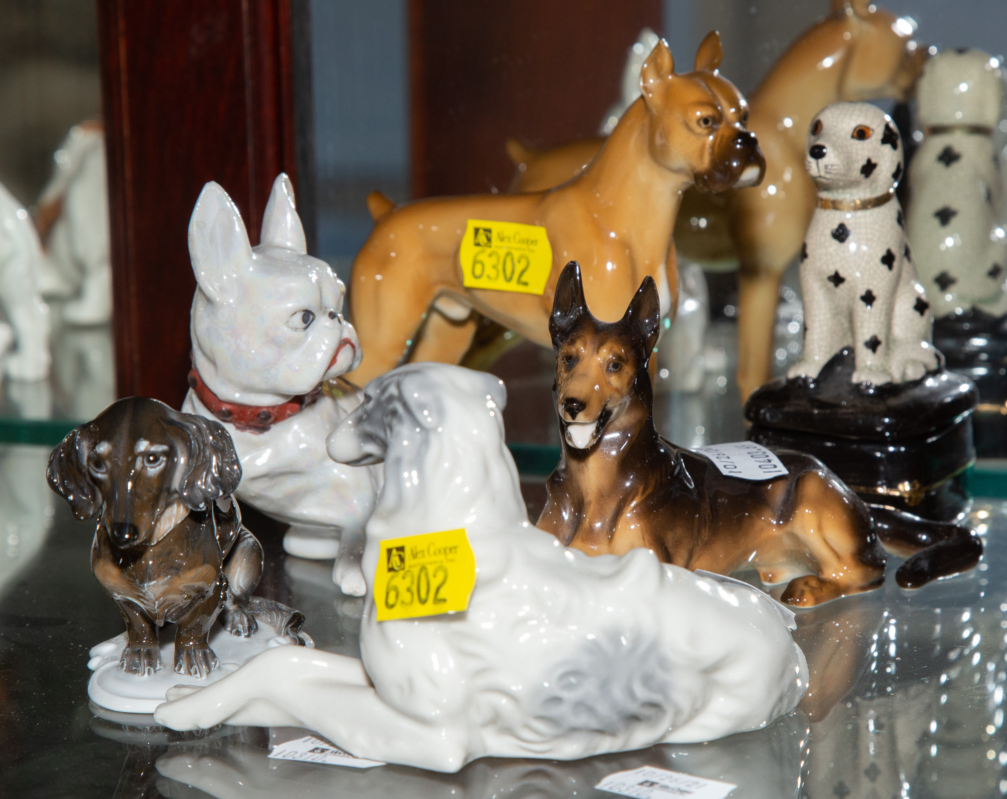 SIX PORCELAIN DOG FIGURES