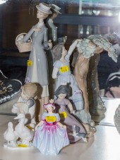 SIX PORCELAIN FIGURES Includin