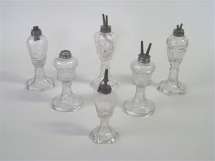 Six pressed uncolored glass fluid