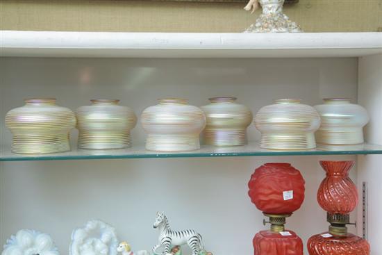 SIX QUEZAL LAMP SHADES. Gold