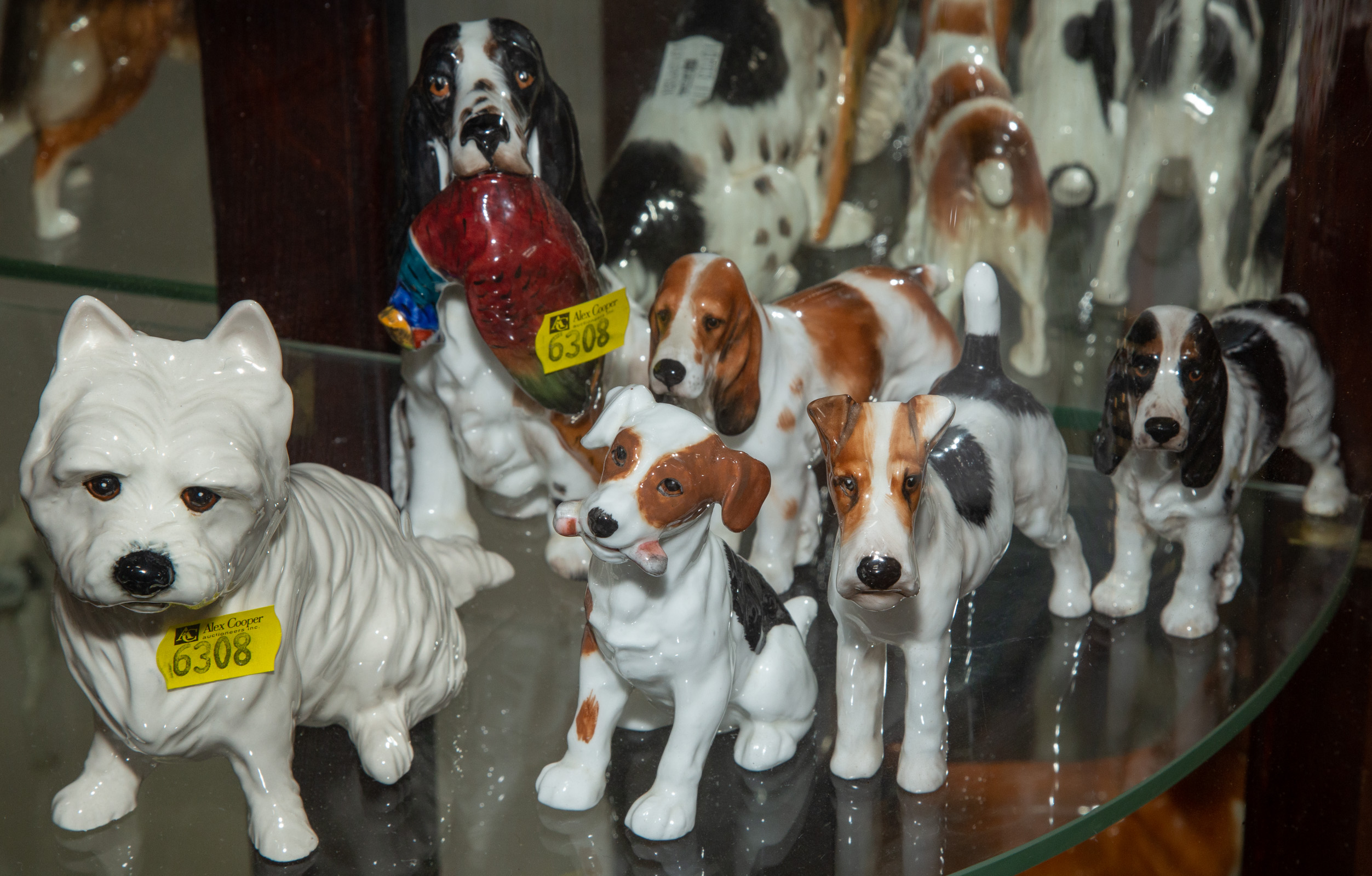 SIX ROYAL DOULTON DOG FIGURES .