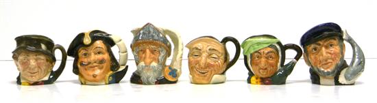 Six Royal Doulton toby jugs