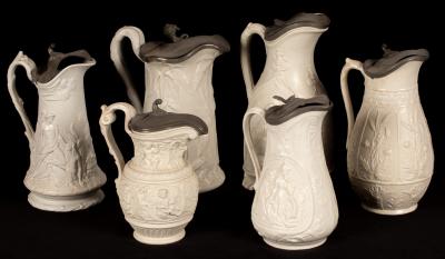 Six saltware jugs, various