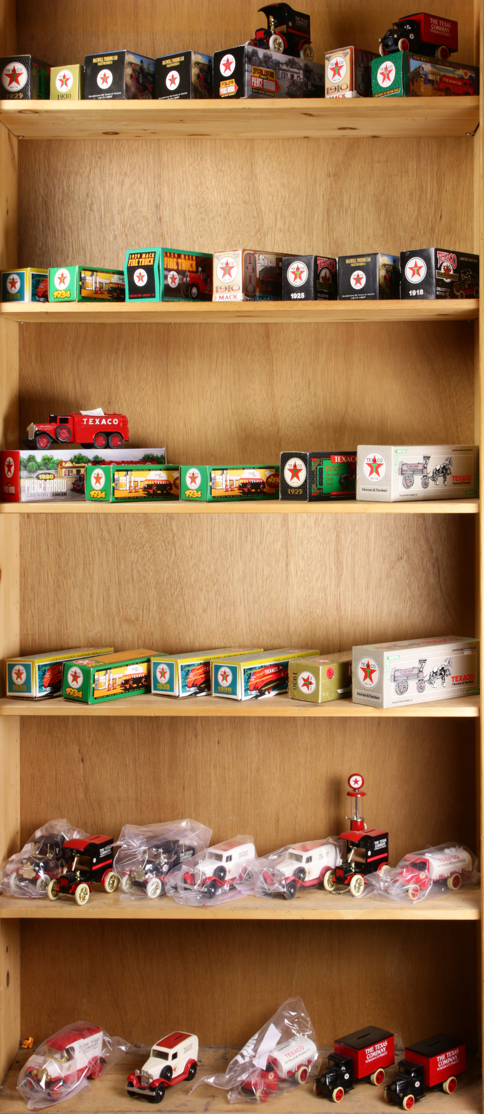 SIX SHELVES OF TEXACO DIE CAST COIN