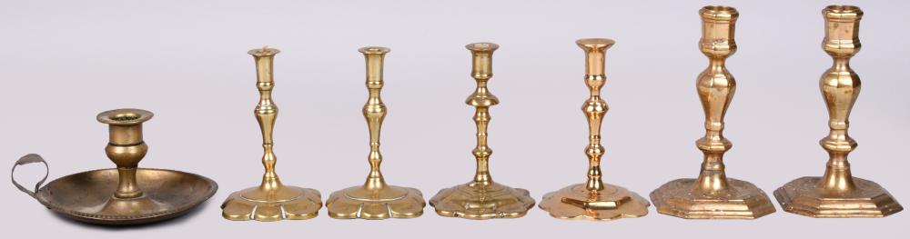 SIX SHORT CANDLESTICKS AND A
