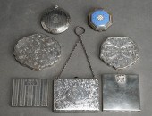SIX SILVER COMPACTS AND A RICH