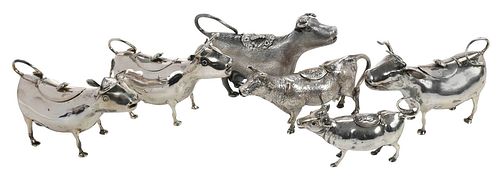 SIX SILVER COW CREAMERSall cow form