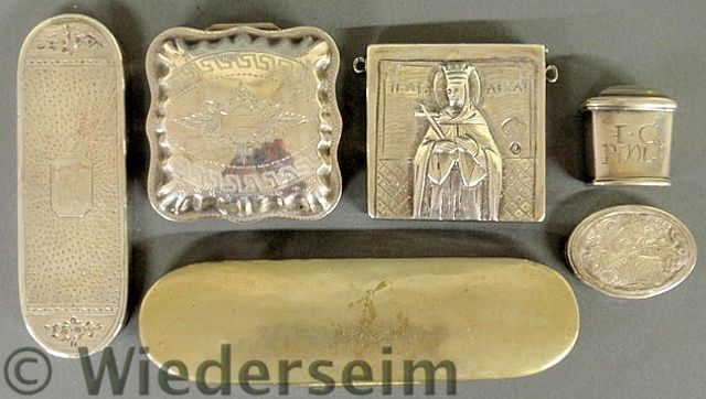 Six small silver boxes and eyeglass