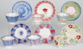 SIX SPATTER CUPS AND SAUCERS<b