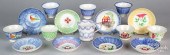 SIX SPATTERWARE CUPS AND SAUCE