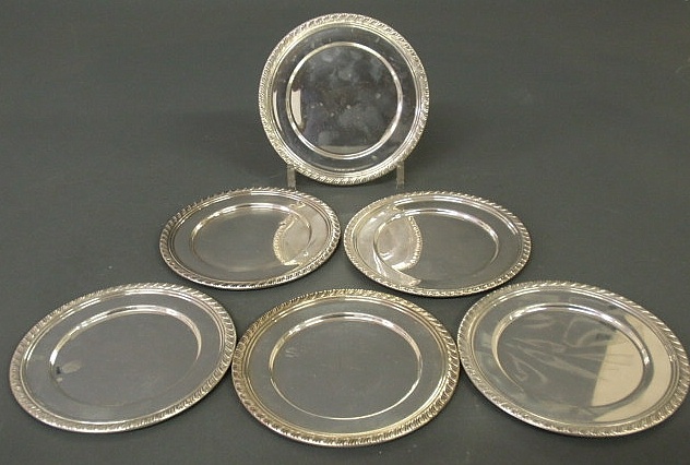 Six sterling silver butter