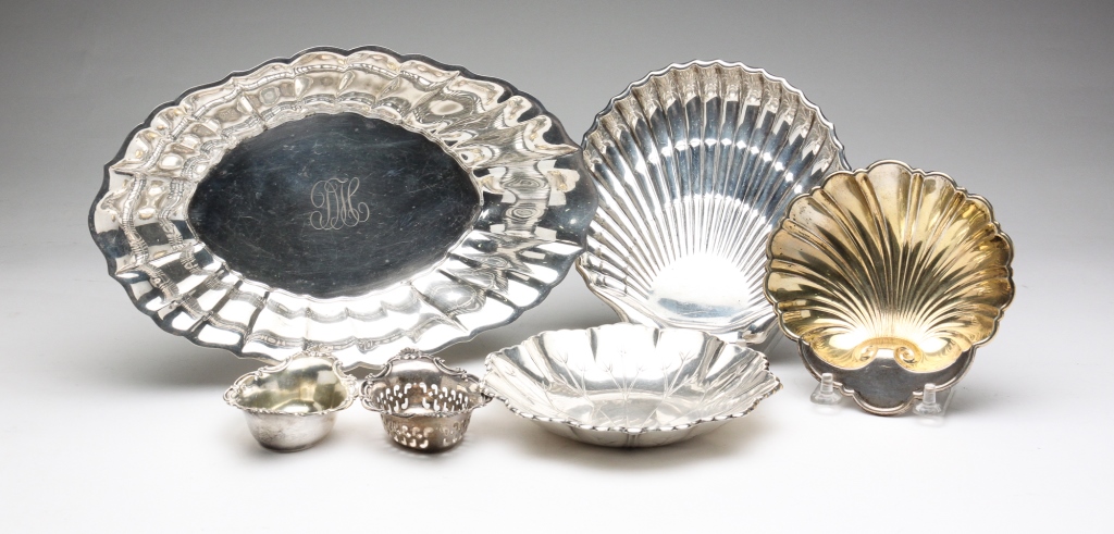 SIX STERLING SILVER DISHES.
