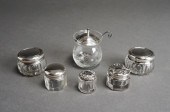 SIX STERLING SILVER LIDDED GLA