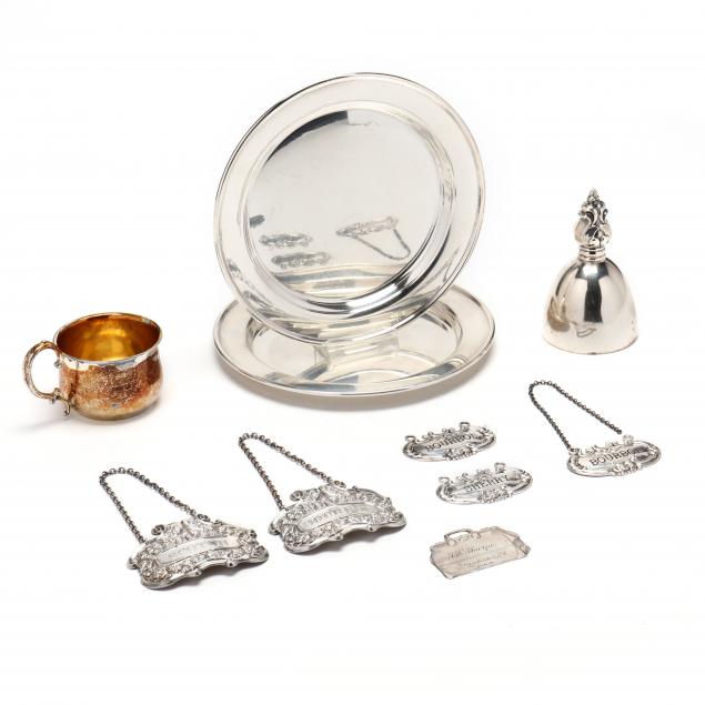 SIX STERLING SILVER TAGS AND