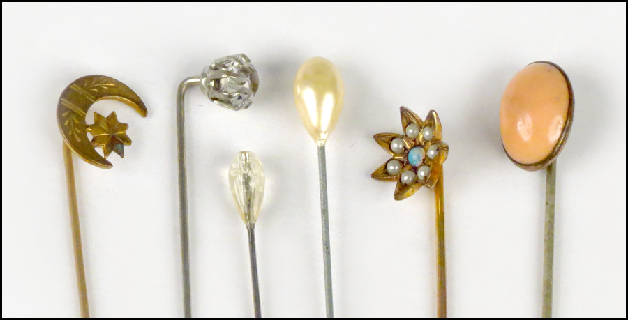 SIX STICK PINS. Condition: No