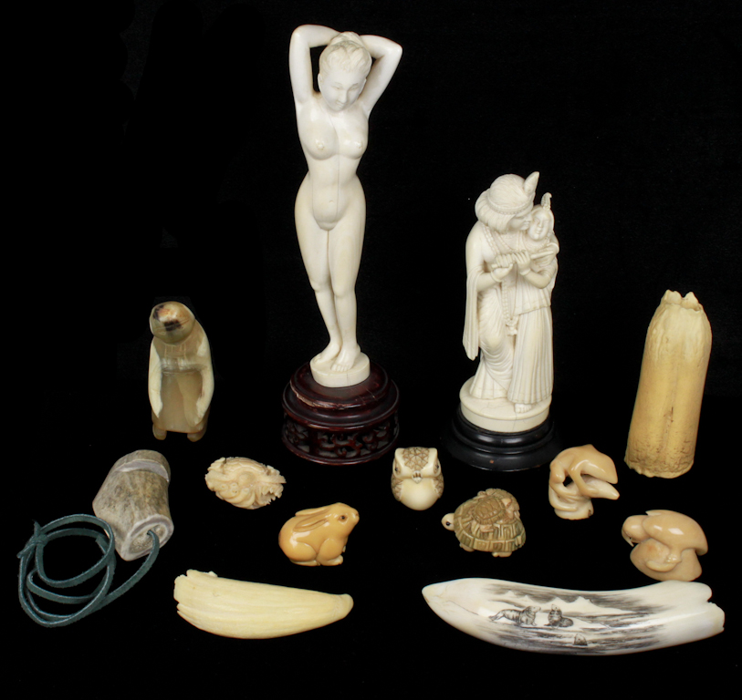 SIX TAGUA NUT CARVINGS AND OTHER
