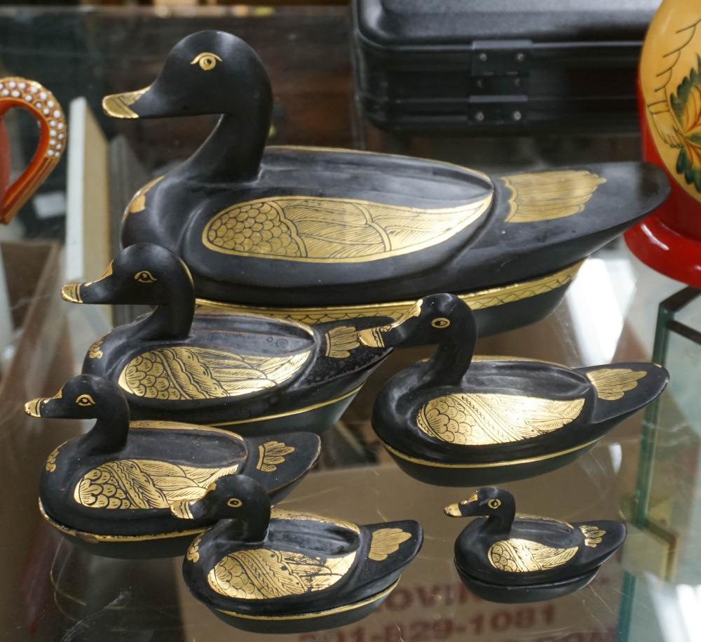SIX THAI GILT DECORATED BLACK