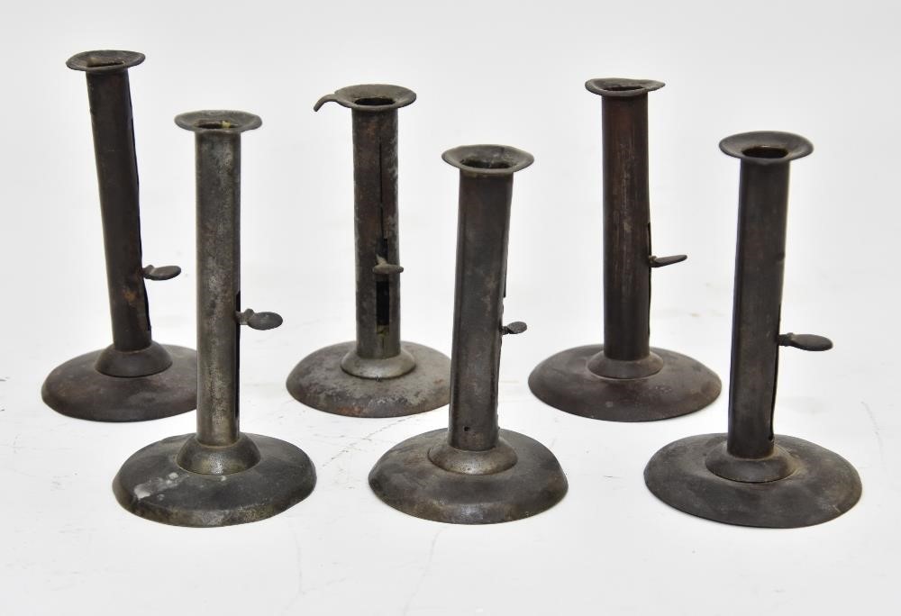 Six tin hog scrapers include a pair