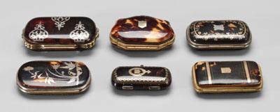 Six tortoise coin cases: all with