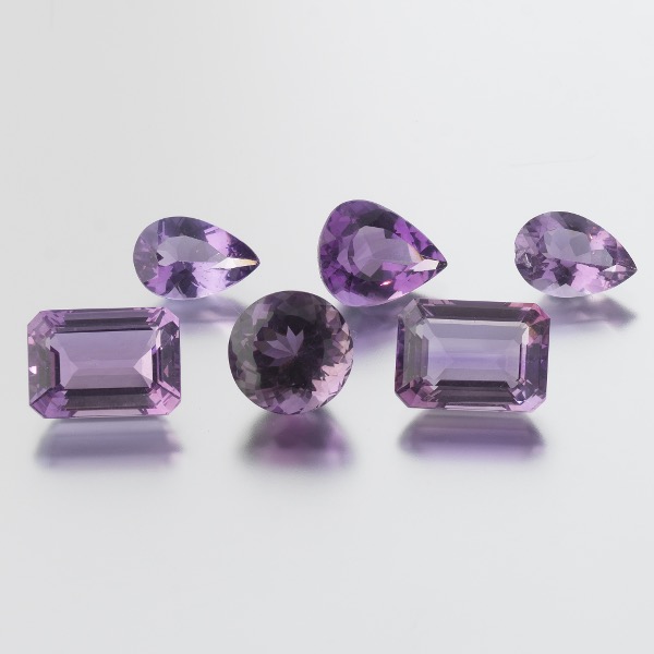 SIX UNMOUNTED 64.38 CT TOTAL
