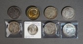SIX U.S. SILVER DOLLARS, ONE 1