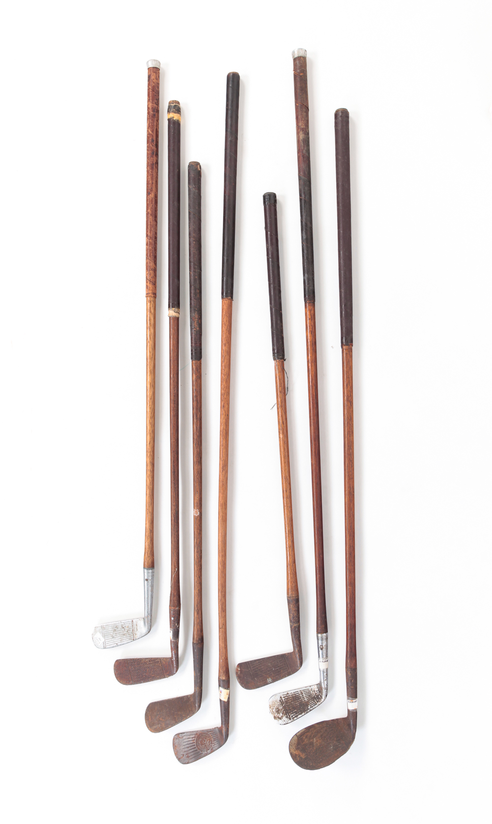 SIX VINTAGE AMERICAN GOLF CLUBS.