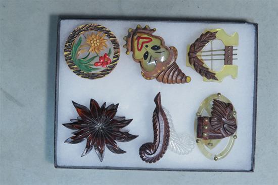 SIX VINTAGE PINS. Bakelite and wood