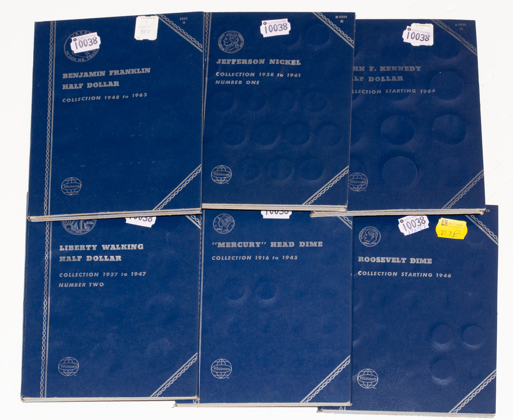 SIX WHITMAN FOLDERS WITH SILVER